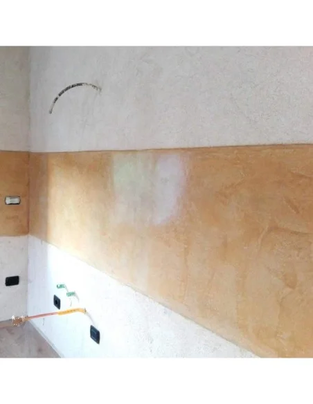 Finitura in Calce e Cocciopesto Giallo dopo intonachino e prodotto protettivo